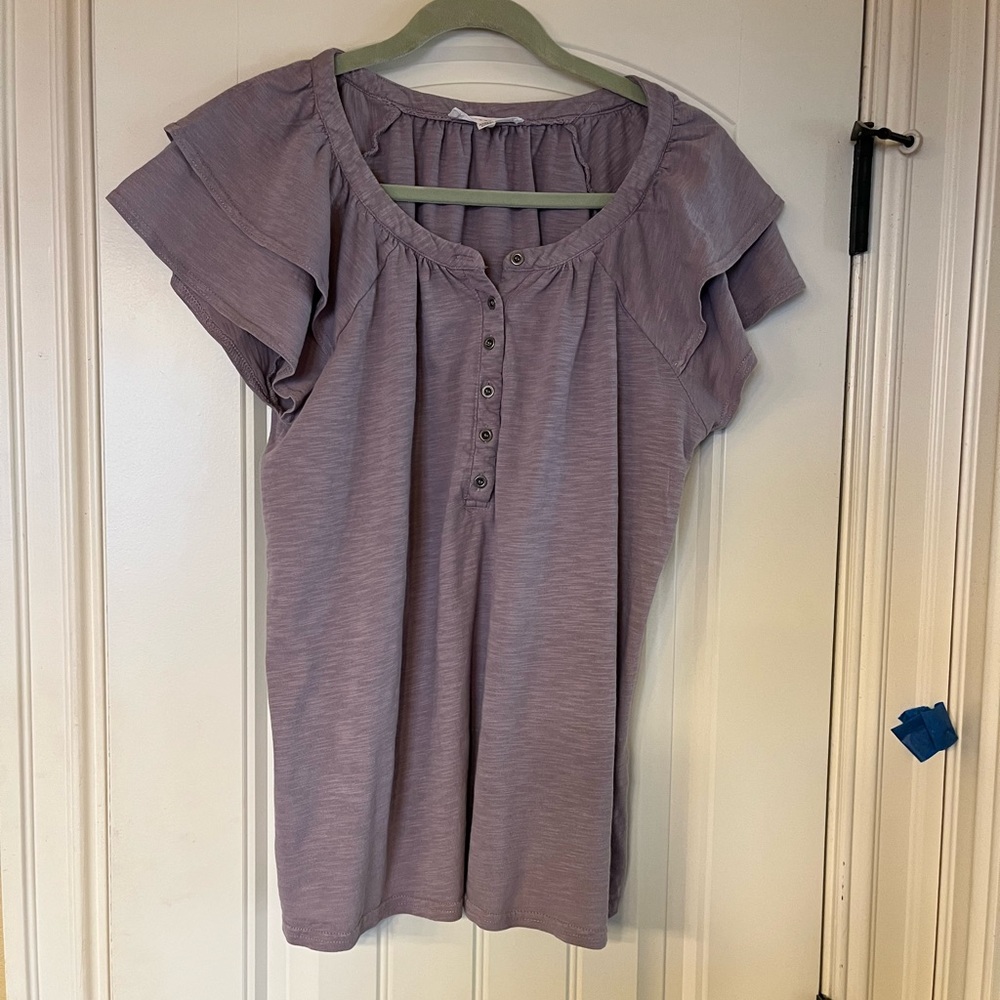 Lavender top with ruffled cap sleeves and button detail